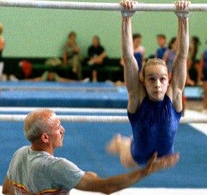 Entrenador y gimnasta. EFE/Rosa Veiga