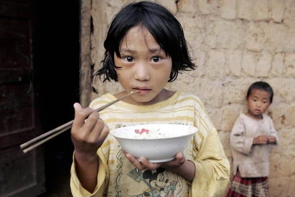 En China investigan si usan niños en pruebas de arroz transgénico